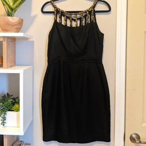 Yoana Baraschi Black Dress with Gold Necklace